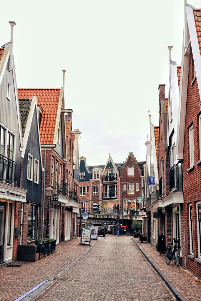Traditional Dutch architecture in a quaint street of Volendam, NH, Netherlands.